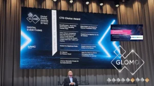 A speaker stands in front of a large screen displaying the "CTO Choice Award" shortlist at the Global Mobile Awards event.
